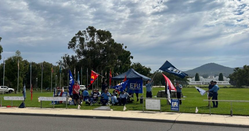 ETU members picketing outside of parliament house on the lawn