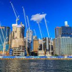 Sydney's darling harbour with major construction works and cranes dotting the buildings