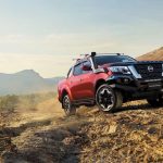 Nissan navara driving up rocky terrain