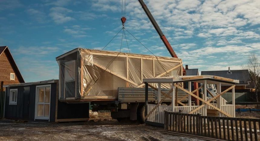 Tiny home being craned in on construction site in Australia