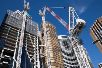 Crane in front of apartment construction in Sydney Australia