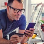 man buying tools online with his credit card