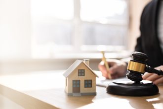 a solicitor works on some property law paperwork