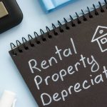 a notepad which says "rental property depreciation"