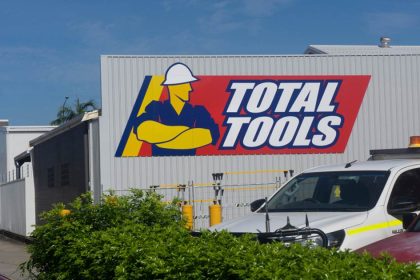 Total tools logo on the side of a store