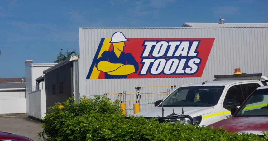 Total tools logo on the side of a store