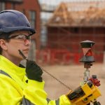 Woman in construction working on job site