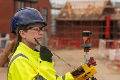 Woman in construction working on job site