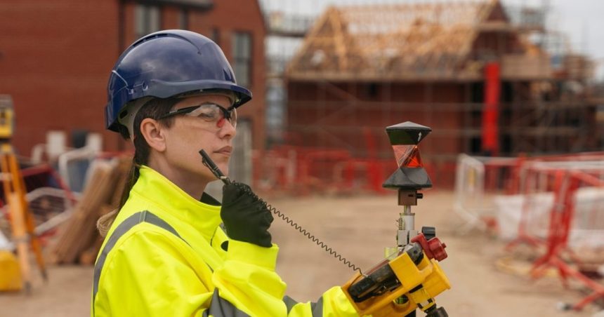 Woman in construction working on job site