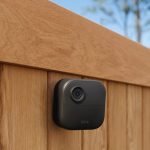 Blink Mini security camera on fence