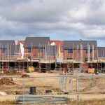 Blocks of suburban homes under construction