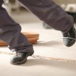 a man trips on a wire on site