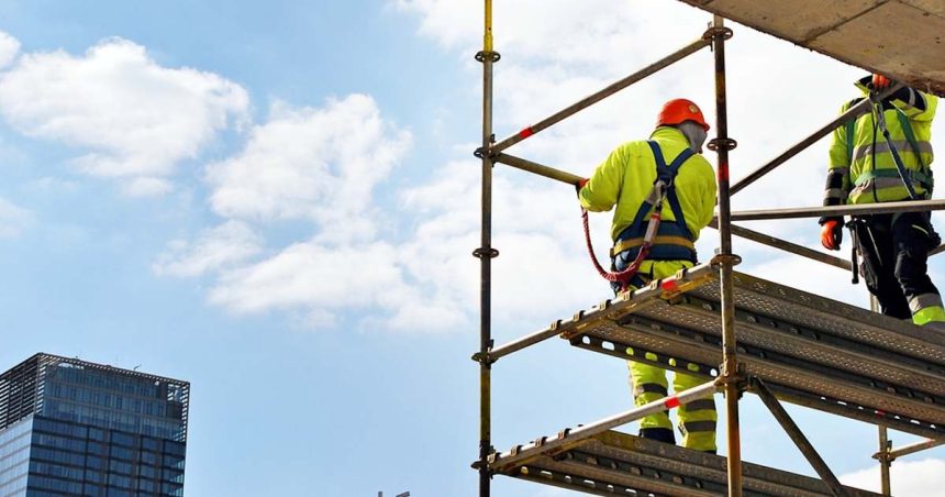 Tradies working on scaffold