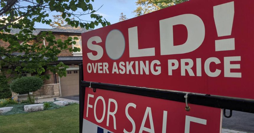 a sold sign outside house