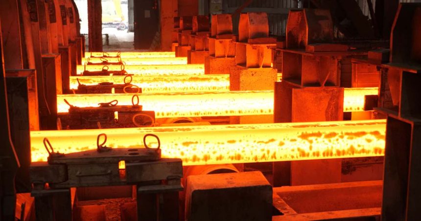 Steel beams being cast in factory