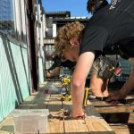 Tradies working on backyard porch