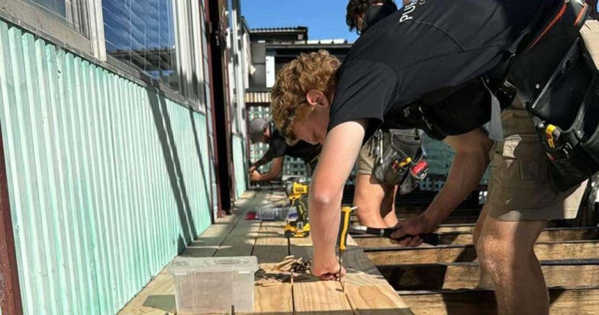 Tradies working on backyard porch