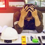 a financially stressed tradie in office