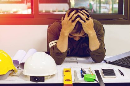 a financially stressed tradie in office