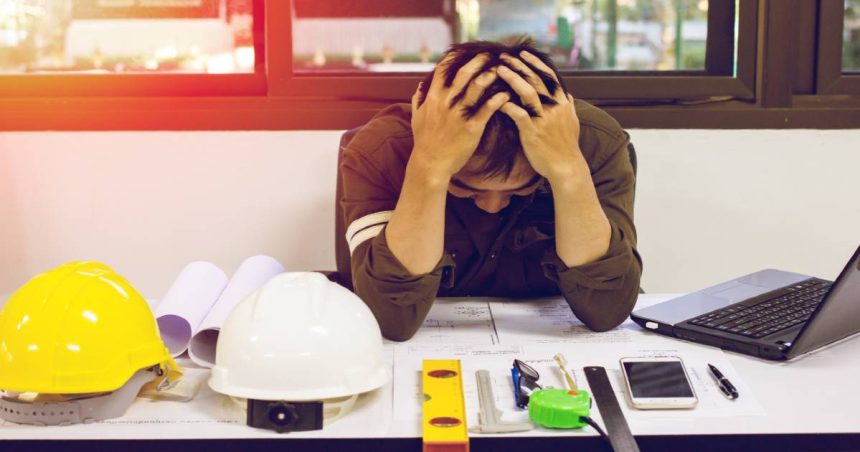 a financially stressed tradie in office